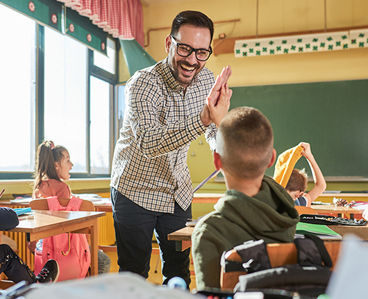 teacher giving a high five